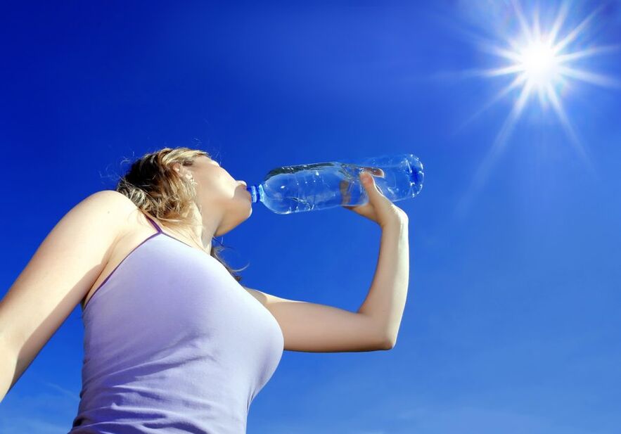 Lazy man drinking water during a diet photo 2